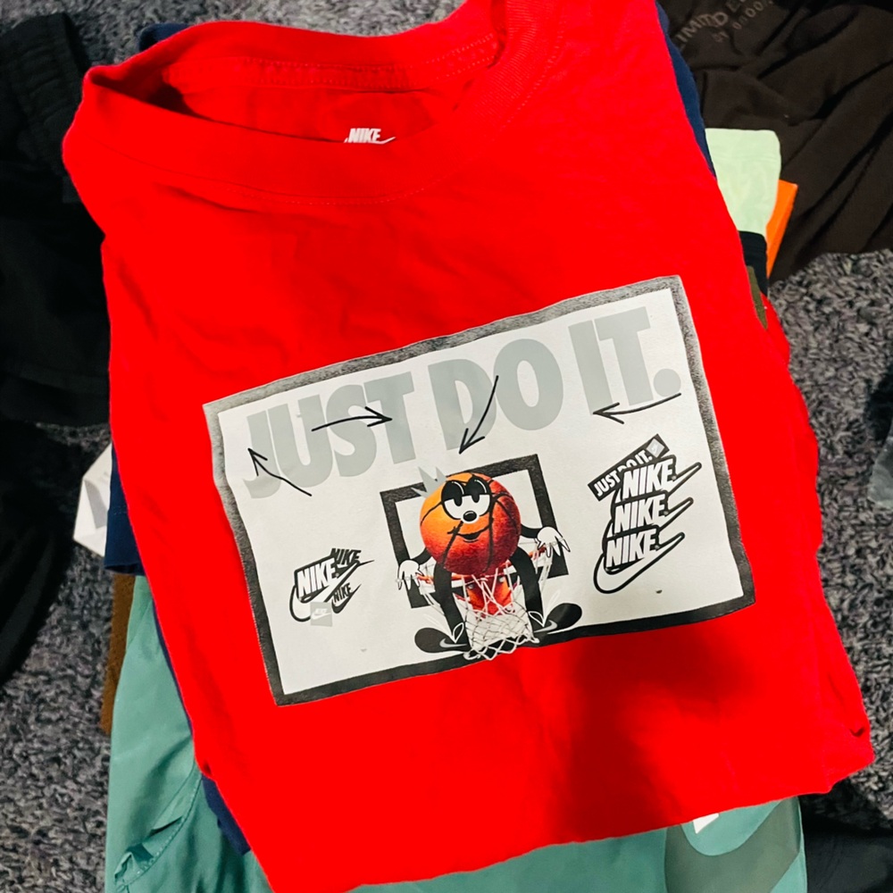 Nike Red Graphic Tee with Cartoon Design